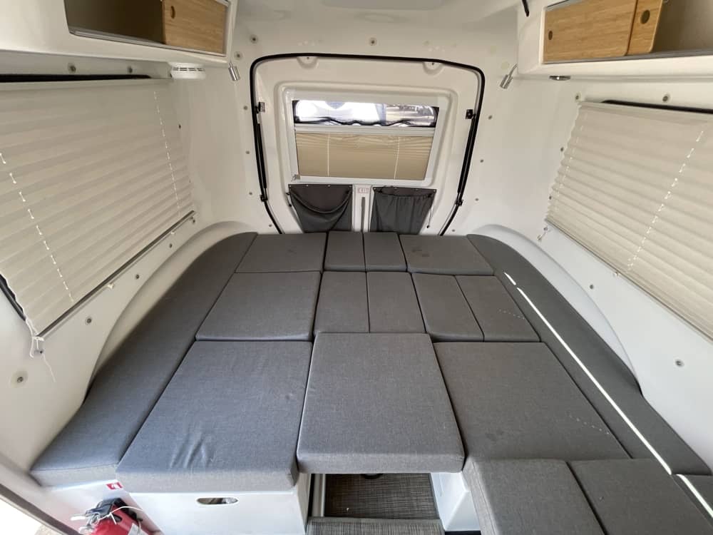 Interior — Adaptiv modules configured as full sleeping area, sleeps up to 4